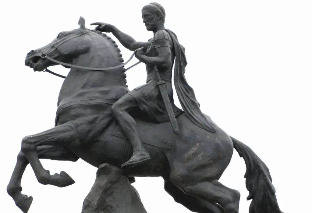 The equestrian statue, reminiscent of Vergina's rich heritage, depicts a historical figure in armor, masterfully holding the reins of a rearing horse.