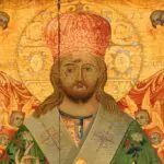 A religious icon resembling a calendar mural depicts a central figure with a halo, adorned in ornate robes and a crown, surrounded by angelic figures. Golden patterns dance across the textured background. This visual tour captivates with its intricate detailing and spiritual symbolism.