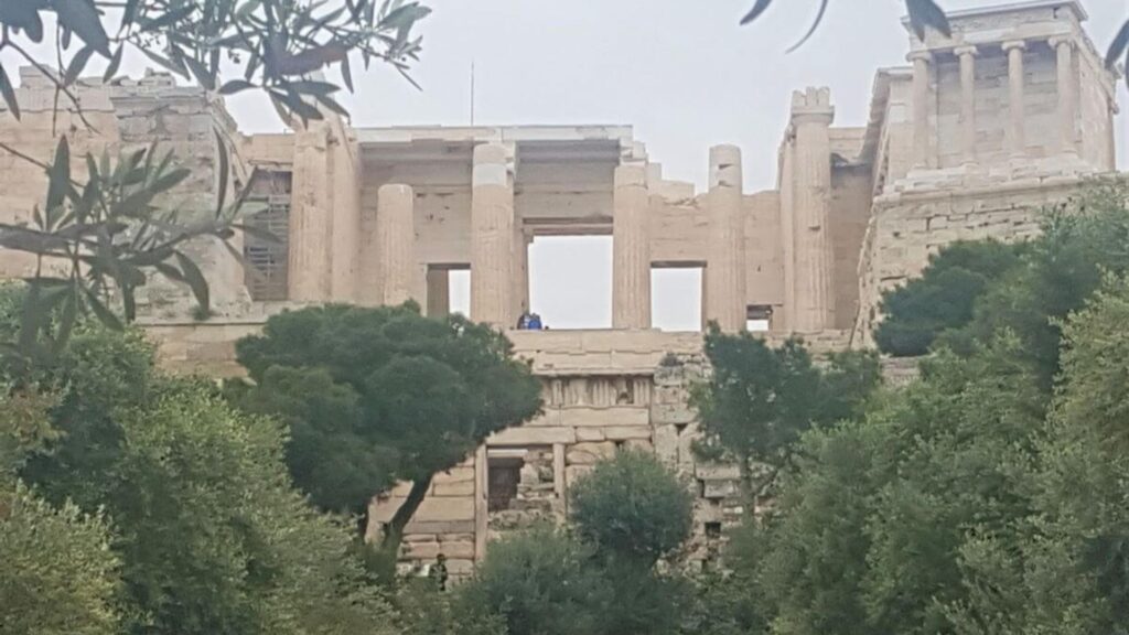 Discover the Acropolis in Athens, Greece, where ancient stone structures peek through lush trees. For expert tips on making the most of your visit, our insider’s guide offers a deeper look into this historic marvel.