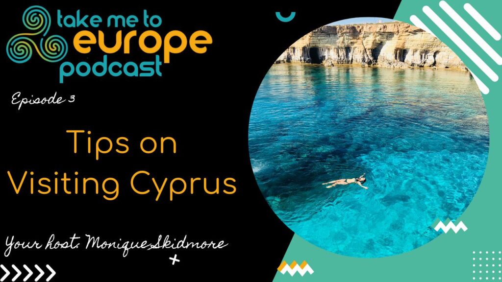 Podcast cover with "Take Me to Europe Podcast" text, Episode 3. "Tips on Visiting Cyprus," hosted by Monique Skidmore. Image shows a person swimming in clear blue water near rocky cliffs, reminiscent of the stunning shores you'd find near Vergina.