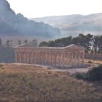 Doric temple of Segesta standing on a grassy hillside in Trapani province, Sicily