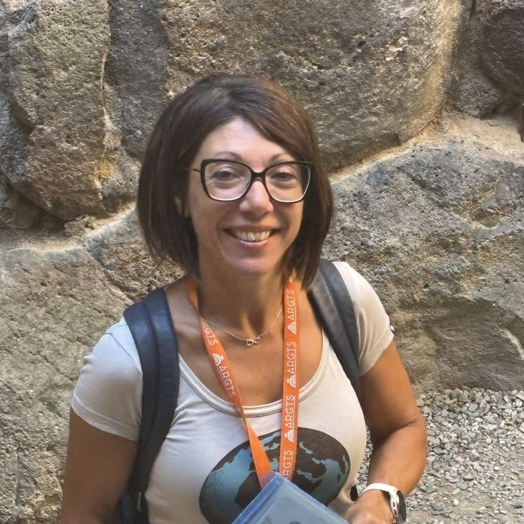 Archaeologist Laura Sedda at Su Nuxaxi, tour leader of Take Me To Europe Tours Sardinia Tour